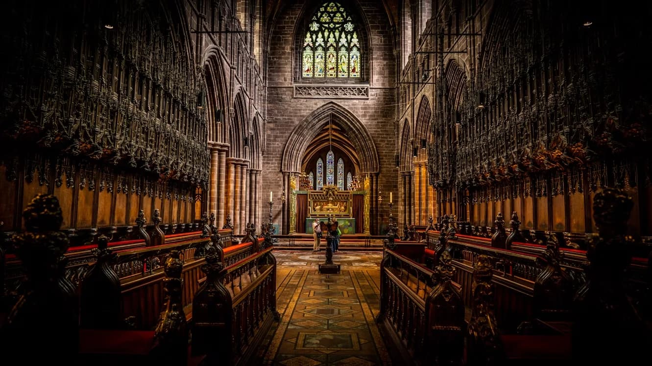 The intricate vaulted ceiling and carved woodwork of Chester Cathedral create a dramatic and majestic interior.